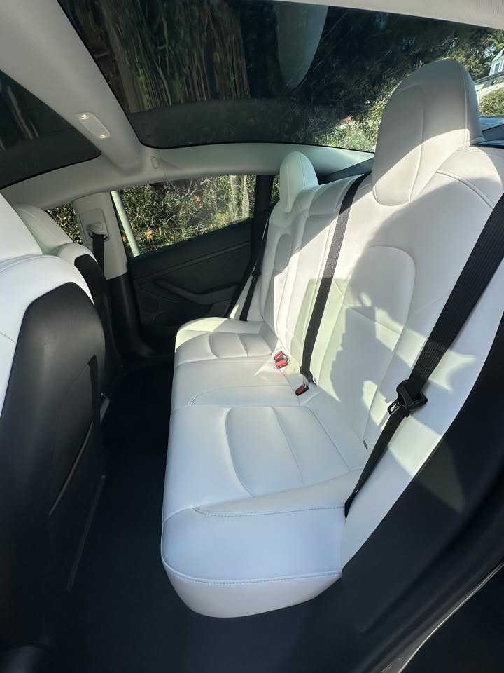 Tesla white leather rear seats detailed to showroom condition
