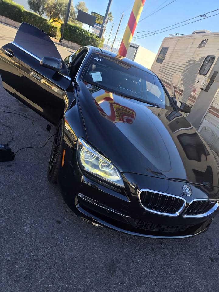 Black BMW coupe glossy after exterior detail